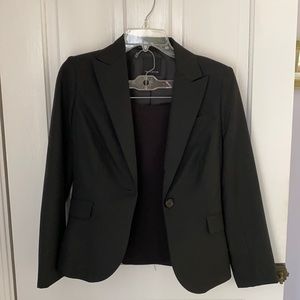 Black limited suit with mini skirt